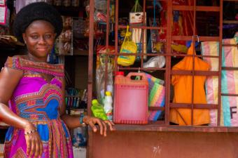 Since her return to The Gambia, Rosamond’s thriving grocery shop has helped her pay for her daughter’s education. IOM/Alhagie Manka